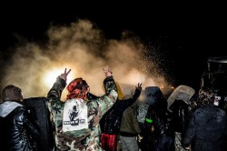  Riot police spray activists at backwater bridge - photo by rob wilson photography