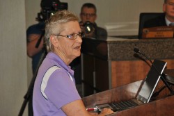 Retired cass county sgt. gail wischmann speaks before cass county commissioners board - photo by C.S. Hagen