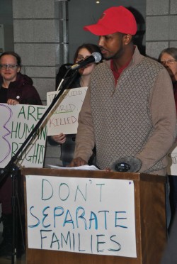 Hukun Abdullahi speaking at the rally - photo by C.S. Hagen