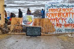 Former main entrance to Oceti Sakowin blockaded against police advance - photo by C.S. Hagen