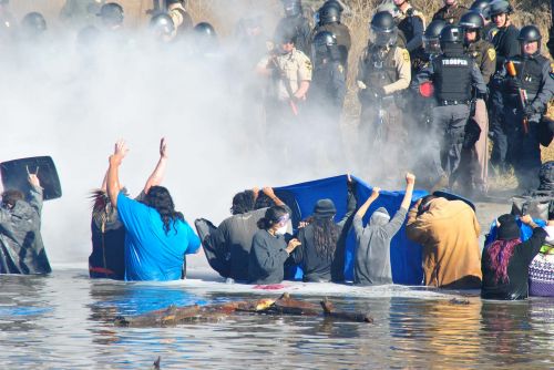 Law enforcement against acitivists in water - photograph by C.S. Hagen