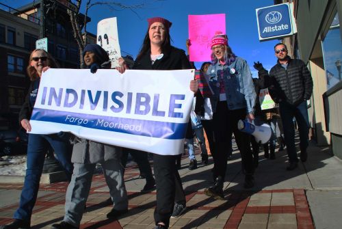 Indivisible FM led the march, and issues such as Black Lives Matter, missing Indigenous women, fight white supremacy, gay rights, women's rights, DACA, and reproductive rights were brought up - photograph by C.S. Hagen