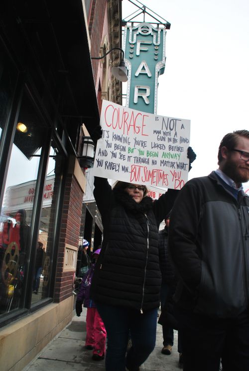 Protestors marching down Broadway - photograph by C.S. Hagen