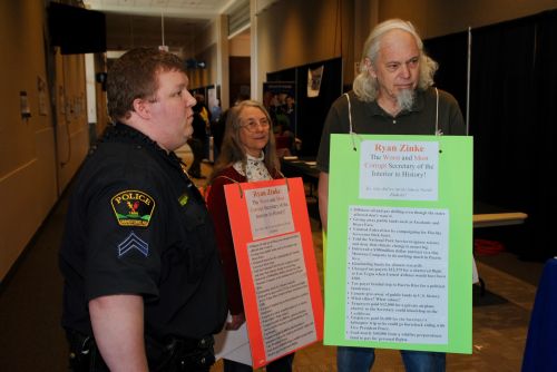 Dexter and Betsy Perkins, of Grand Forks, approached by police and escorted out during the ND GOP Convention - photograph by C.S. Hagen