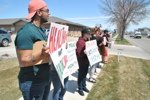 Protesters outside of Kevin Cramer's Fargo office - photograph by C.S. Hagen