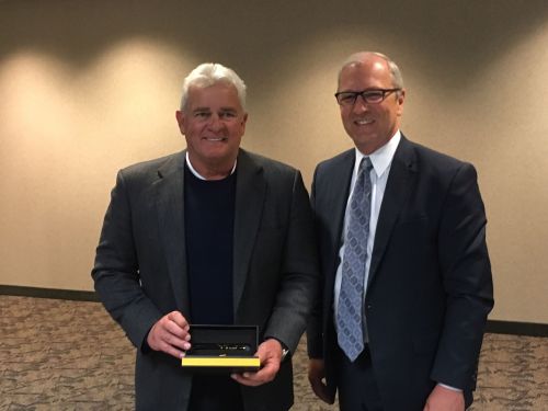 Congressman Kevin Cramer giving away President Trump's signature pen to Energy Transfer Partners CEO Kelcy Warren - photo posted on POVnow Facebook page