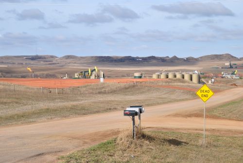 The Bakken oil rigs and flaring can be seen as far as the eye can see - photograph by C.S. Hagen