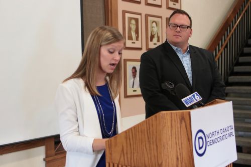 Kylie Oversen, Democratic candidate for Tax Commissioner, and Josh Boschee, Democratic candidate for Secretary of State, announce their plans to modernize state government services - photograph by C.S. Hagen