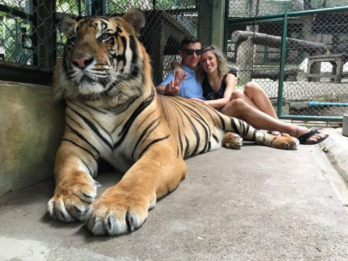 Jon Wayne and his wife Jordan with a tiger - photograph provided by Jon Wayne