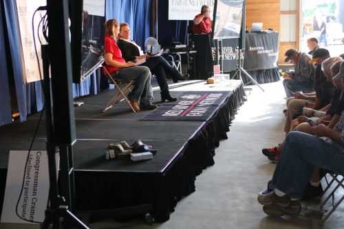 U.S. Senator Heidi Heitkamp moments before speaking at what was supposed to be a debate with current U.S. Congressman Kevin Cramer before farmers at the Big Iron Farm Show on Tuesday, September 11, 2018 - photograph by C.S. Hagen