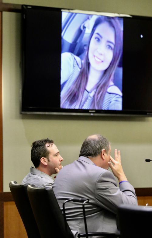 William Hoehn and defense attorney Daniel James Dorgen in court with picture of Savanna Greywind on court monitor - photograph by C.S. Hagen