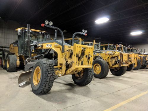 Motor graders lined up at Fargo Public Works - photograph by Ryan Janke