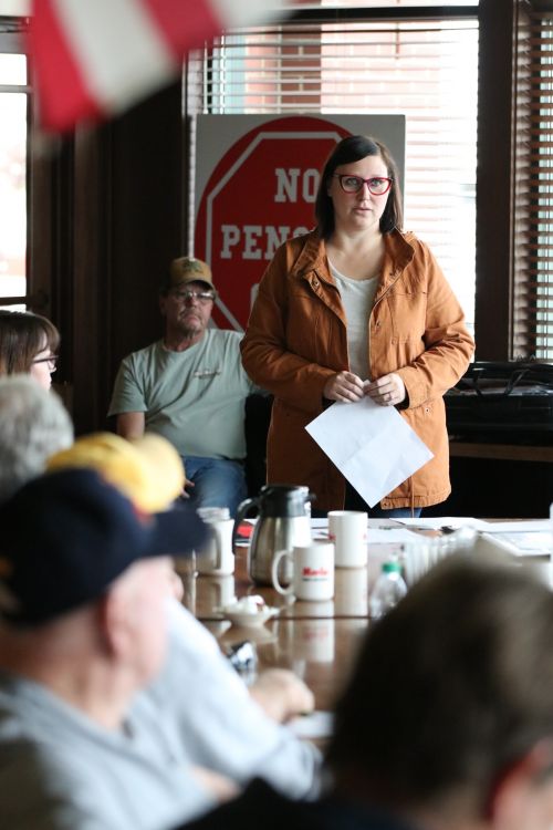 Callie Detar speaking before the group of concerned citizens fighting to keep their pensions - photograph by C.S. Hagen