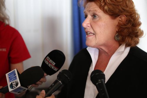 Senator Heidi Heitkamp talking to reporters during an interview earlier this year - photograph by C.S. Hagen