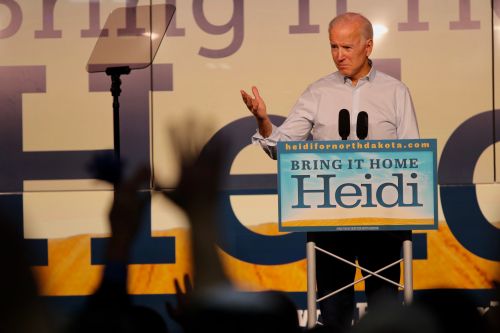 Former Vice President Joe Biden speaks at the Fargo Air Museum to kick off Bring It Home Heidi! final campaign stretch before Election Day - photograph by C.S. Hagen