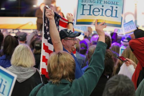 Hundreds of people attended Bring It Home Heidi! rally at the Fargo Air Museum Thursday morning - photograph by C.S. Hagen