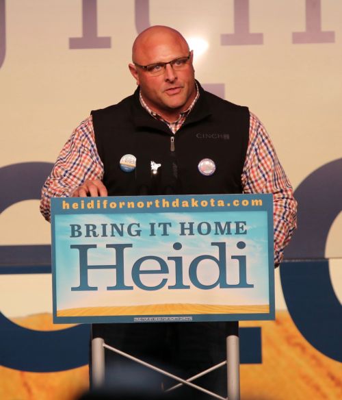 Jason Ehlert, president of the North Dakota State Building & Construction Trades Department, is the man featured in Senator Heidi Heitkamp's arm wrestling advertisement - photograph by C.S. Hagen