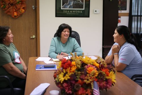 Carry Nichols (center), Nadine Yellow (right), and Etta Brave Crow (left) - talk about the voter ID laws and how their community has been effected - photograph by C.S. Hagen