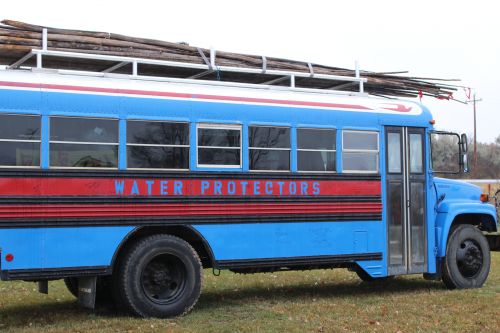 Smaller Standing Rock Water Protector bus that will be driving people to the polls on November 6 - photograph by C.S. Hagen