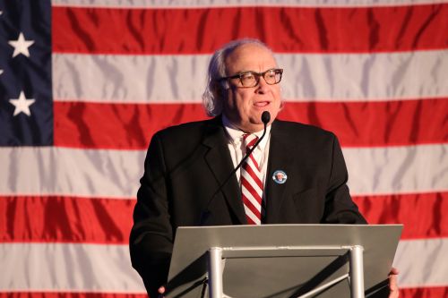 Attorney David Thompson speaks before Democrats - photograph by C.S. Hagen