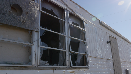 Hail damaged homes including windows, doors, roofs - video screenshot by Charles Banner