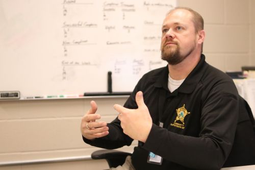 Community Supervision Unity Corporal Chad Violet speaks about how his department is preparing for the holidays - photograph by C.S. Hagen