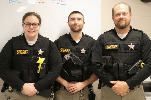 Left to right - Deputy Ashley Bates, Deputy Eric Benson, and Corporal Chad Violet of the Community Supervision Unit - photograph by C.S. Hagen