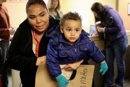 Jessica Perez and her son Malachi after signing the letter to Congressman Kevin Cramer urging him to help Savanna's Act pass - photograph by C.S. Hagen