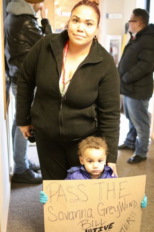 Jessice Perez and son Malachi outside of Congressman Kevin Cramer's office - photograph by C.S. Hagen