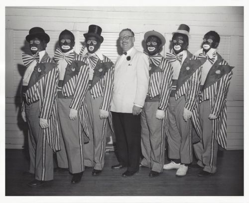 Performers in blackface pose for a photograph at the Fargo Elks Lodge