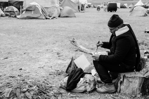 Patrick Martinez at DAPL camps - photograph by Estevan Oriol