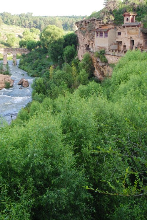 Not far from Boluo are a complicated system of caves inside a temple - photograph by C.S. Hagen