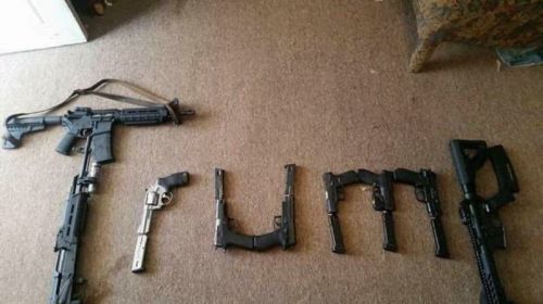 Weapons lined up to form the word Trump and picture posted by RedRightHand