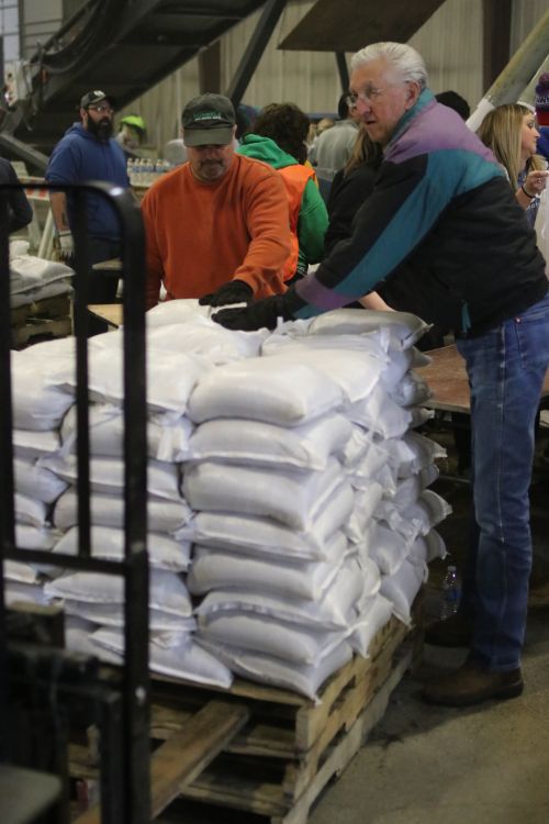 Donald Voeller, 80 years old, helping prepare the city fight against the potential flood of 2019 - photograph by C.S. Hagen