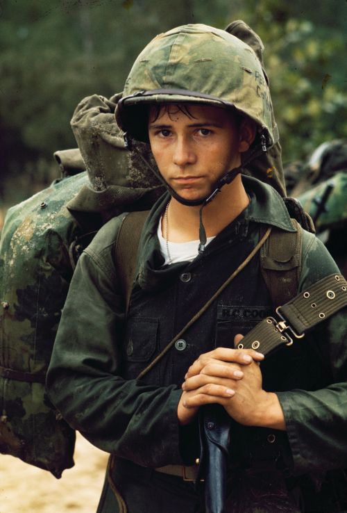 Da Nang Vietnam - A young Marine waits on the beach during the Marine landing - unknown photographer August 3 1965 National Archives Records of the United States Marine Corps