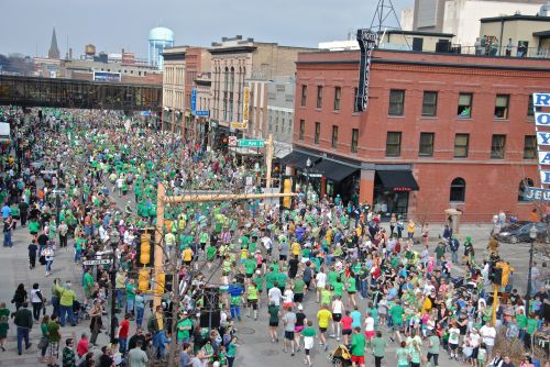 Runners in race through downtown Fargo - photograph by C.S. Hagen