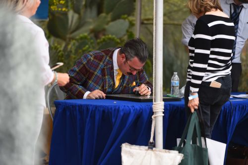 Nicholas Lowry center appraises an item at the ANTIQUES ROADSHOW production event on Tuesday, April 16, 2019 at the Desert Botanical Garden in Phoenix, AZ. - photograph by Meredith Nierman for WGBH