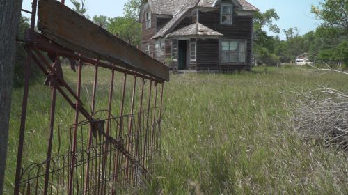 Miranda house and fence - South Dakota Public Broadcasting producer Stephanie Rissler 