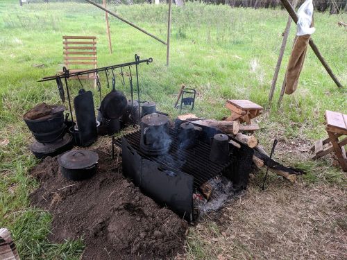 Campfire with true cookware of the time period - photograph by Ryan Janke