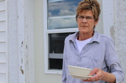 Carol Steichen and a bowl of her famous Knoephla soup - photograph by C.S. Hagen