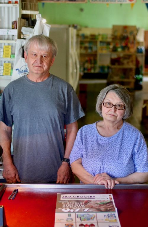 Following their parents' footsteps Terry Gruebele and his sister Verleen have been running the T & V Grocery Store in Pettibone for 33 years - photograph by C.S. Hagen