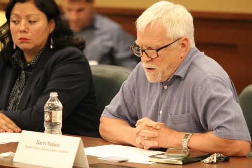 Barry Nelson and Ruth Buffalo giving testimony - photograph by C.S. Hagen