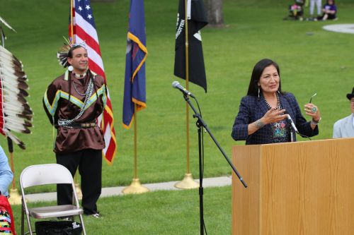 Congresswoman Debra Haaland speaking at Shane Balkowitsch's book signing ceremony - photograph by C.S. Hagen