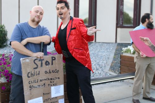 Drag king Carson Jennings welcomes the protestors - photograph by C.S. Hagen