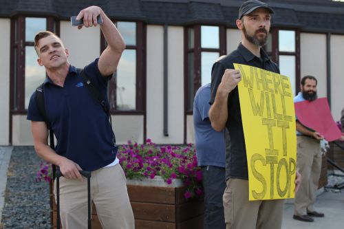 Pete Tefft - unit leader for the local National Socialist Movement protesting with others at the All Ages Drag Show for Pride Week - photograph by C.S. Hagen