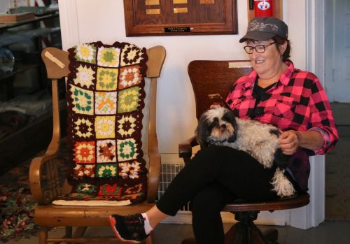 Carmen Rath-Wald and her dog Lucy at the Logan County Historical Society in Napoleon - photograph by C.S. Hagen