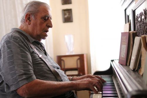 Victor Wald on piano - photograph by C.S. Hagen