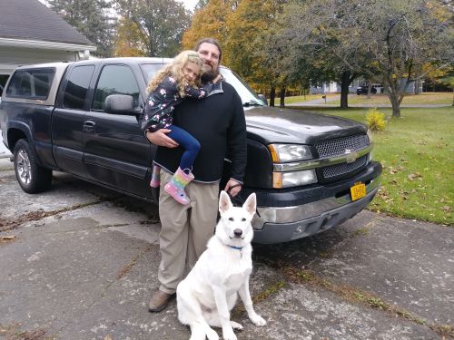 Aaron Dorn, his daughter Lily, their dog Odin, and the 2003 Chevy Silverado - photograph provided by Aaron Dorn