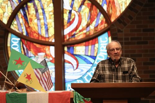 Senator Tim Mathern speaking during an event to raise awareness for the Kurdish plight - photograph by C.S. Hagen