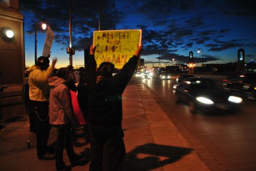 Protestors on Veterans Memorial Bridge in Fargo 2017 - photograph by C.S. Hagen